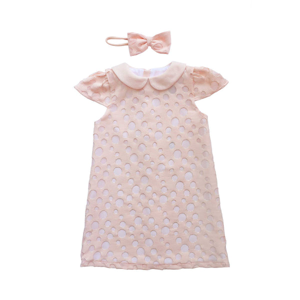Alli.C, baby girl and toddler pink dress with gathered cap sleeves and a peter pan collar. This timeless chic girls dress comes with a matching bow headband.