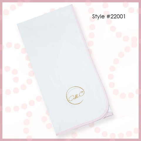 White 100% Cotton Receiving Blanket with white silk lining. This timeless blanket is trimmed in pink and has the Alli.C logo embroidered in gold.